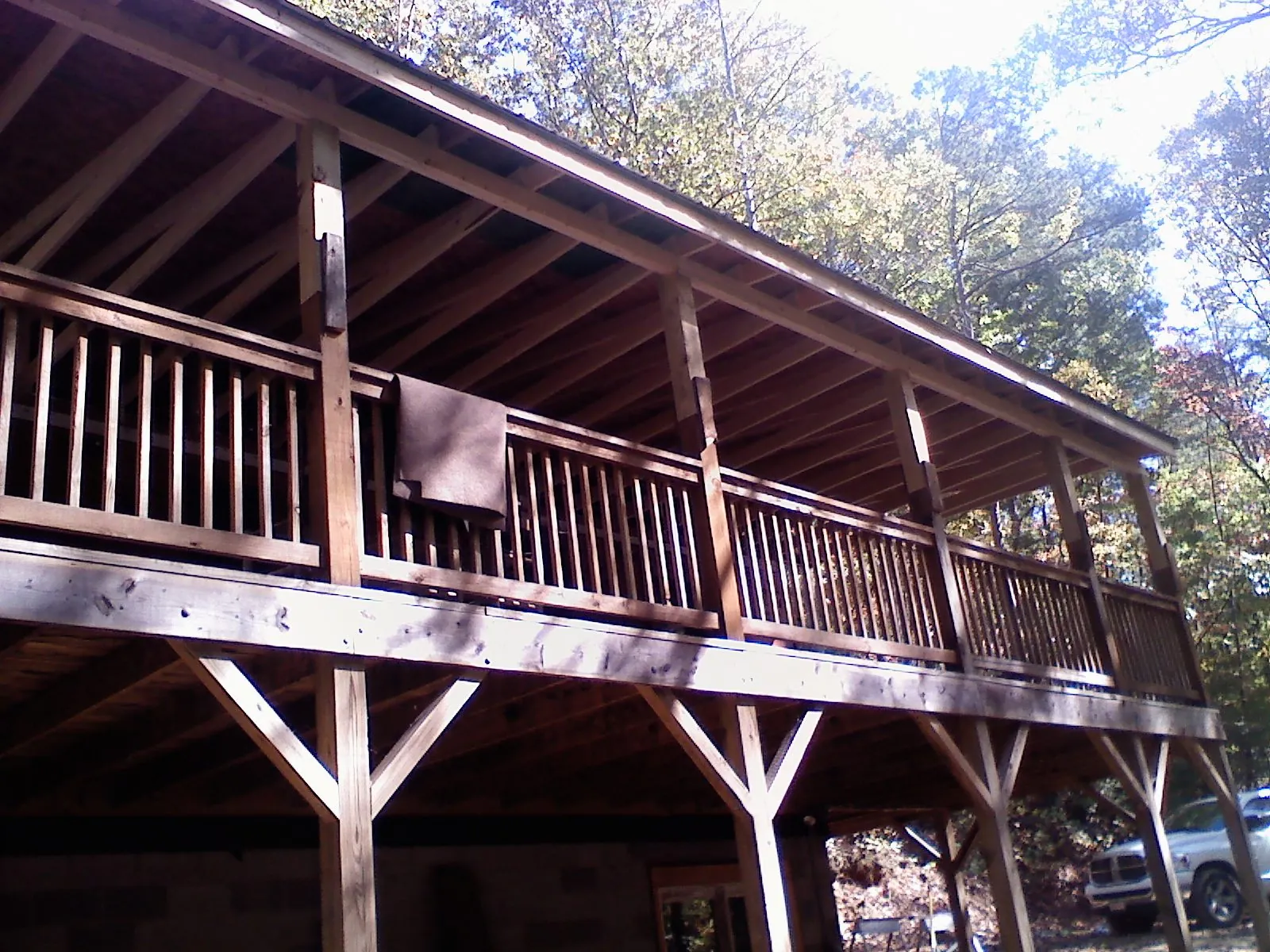 Timber framing under a new elevated porch and deck — Roof Leak Repair in White Earth by Roofing Brothers